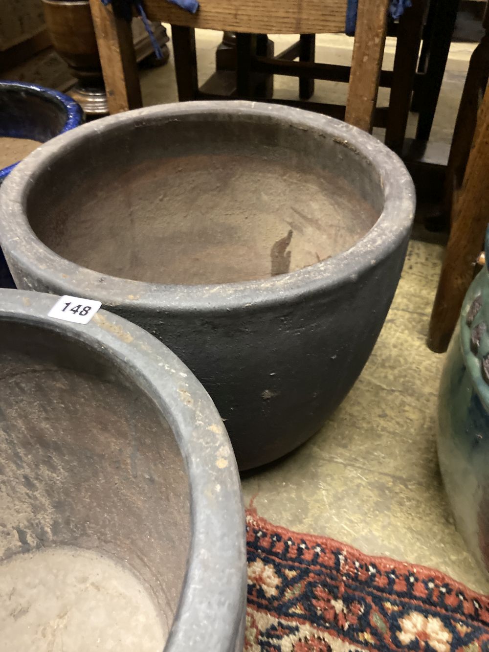 A pair of glazed earthenware garden planters, diameter 38cm